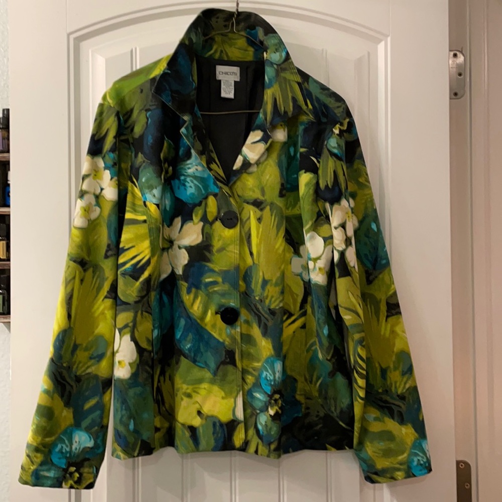 Chico’s Women’s fall/spring Jacket.  2 button front with 2 on seam slit pockets